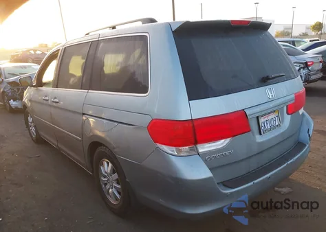 2010 Honda Odyssey Ex z USA, uszkodzony, nr VIN 5FNRL3H47AB020272